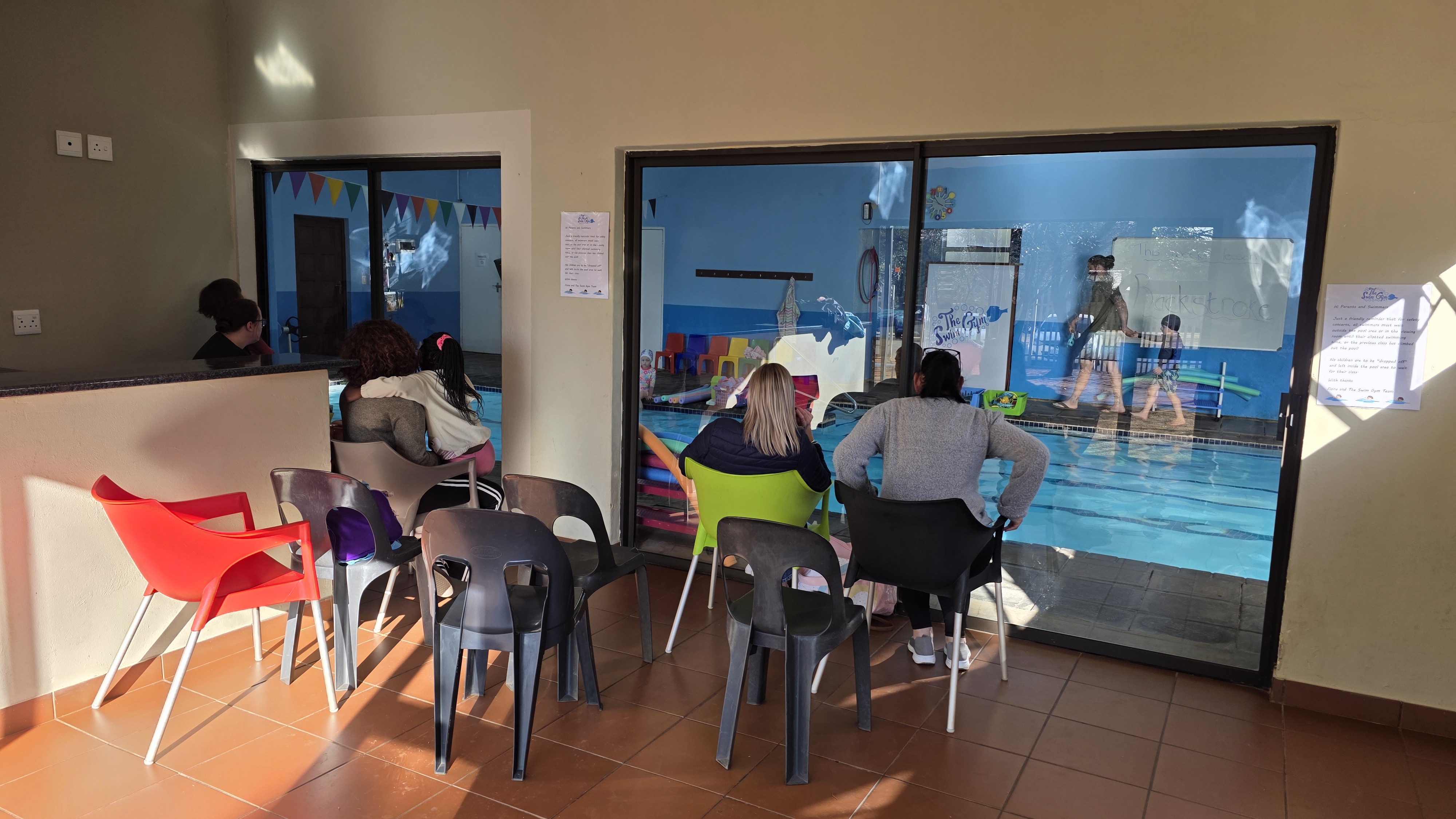Parents watching a lesson